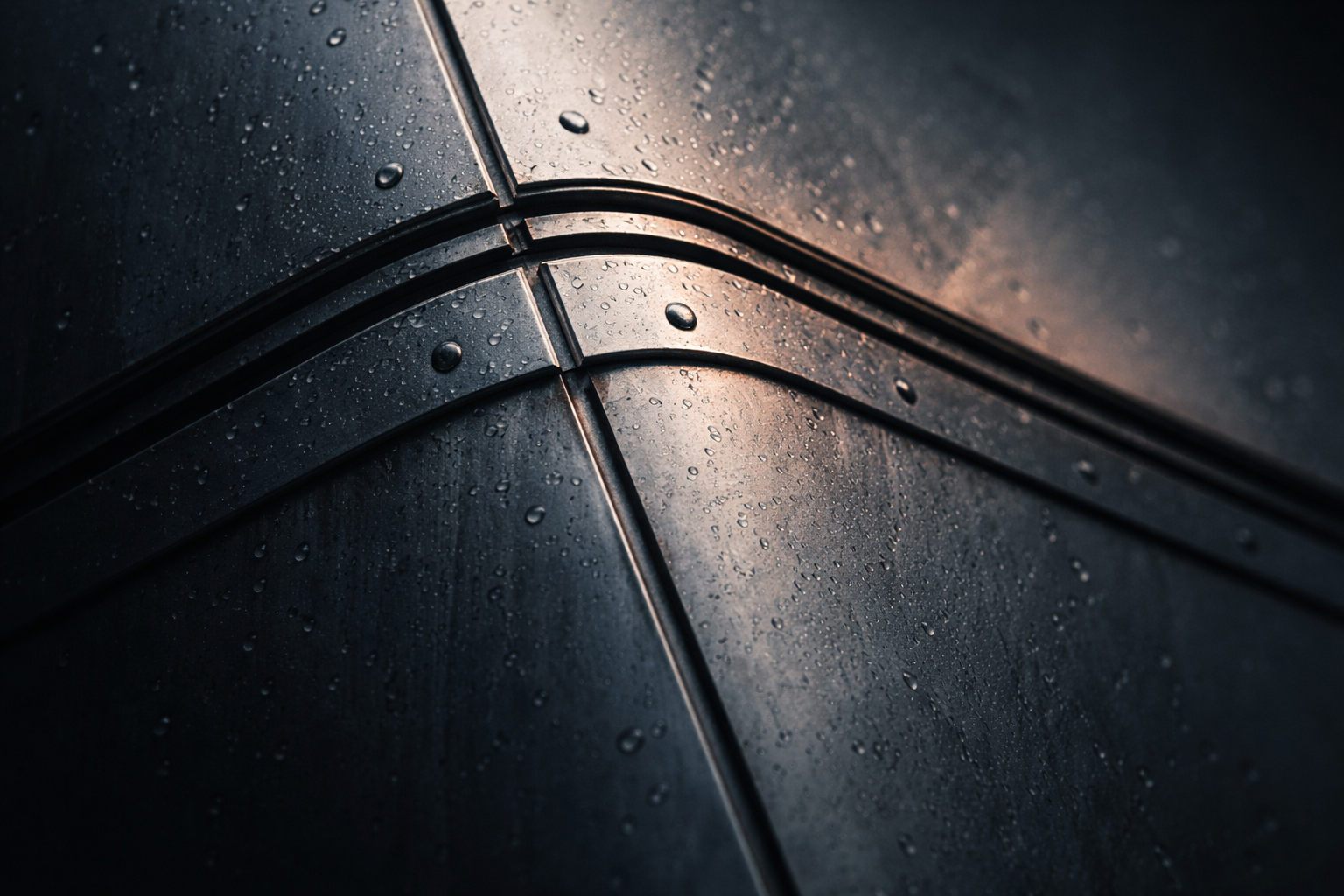 Macro close-up of a curved unbranded building facade seam with rivets and rain droplets, softly lit by dawn and framed in the upper two thirds, lower third kept uncluttered.
